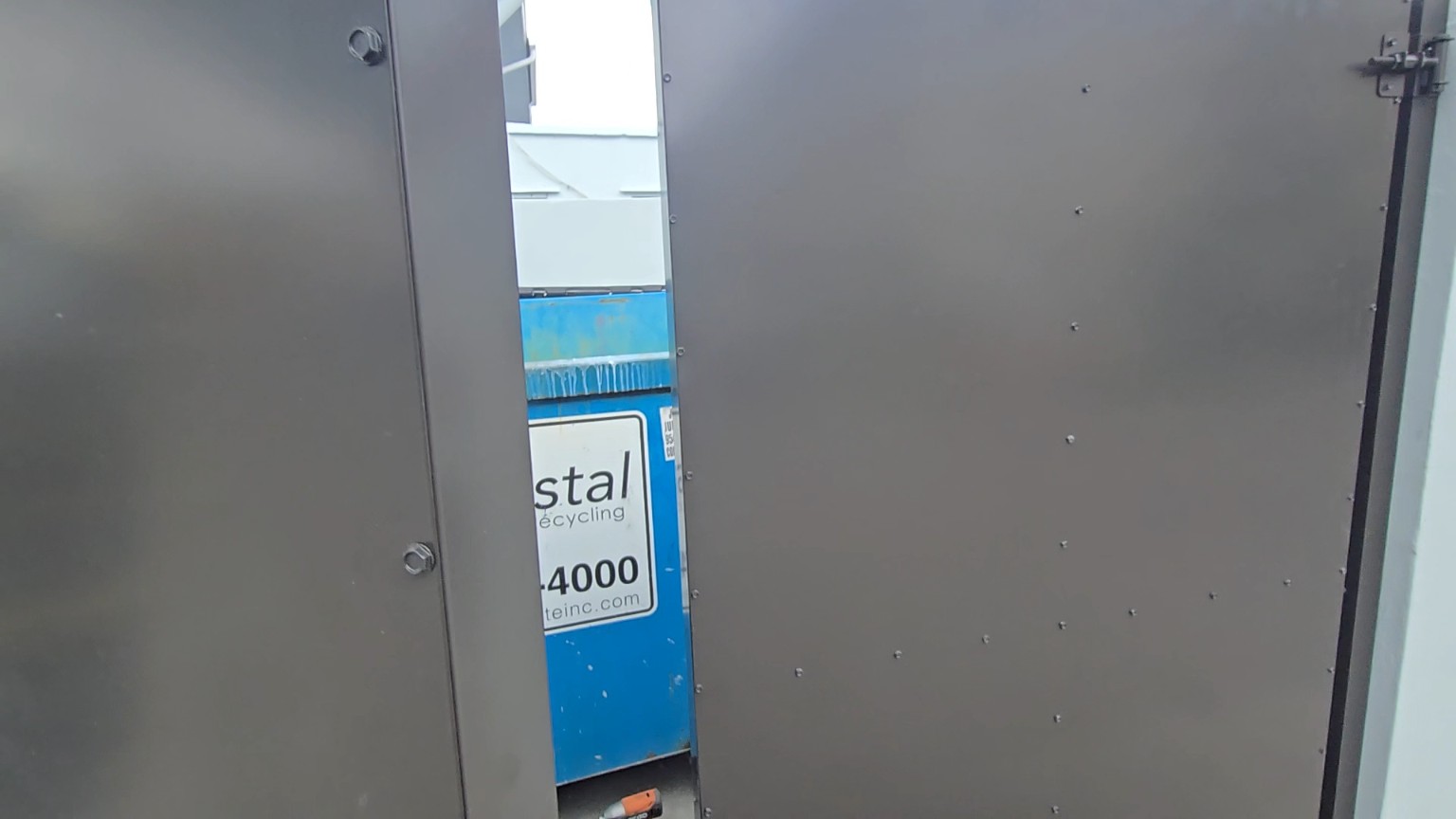 Dumpster door alignment detail